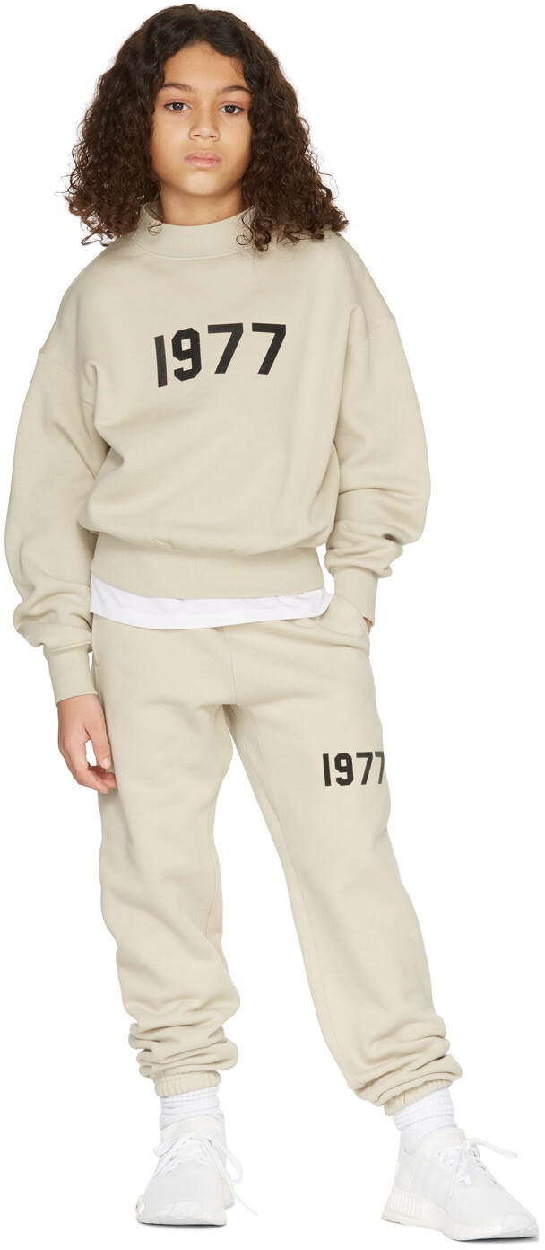 

Детский бежевый свитшот 1977 года Fear of God ESSENTIALS