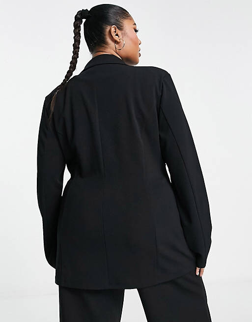 

Черный трикотажный пиджак с поясом ASOS DESIGN Curve