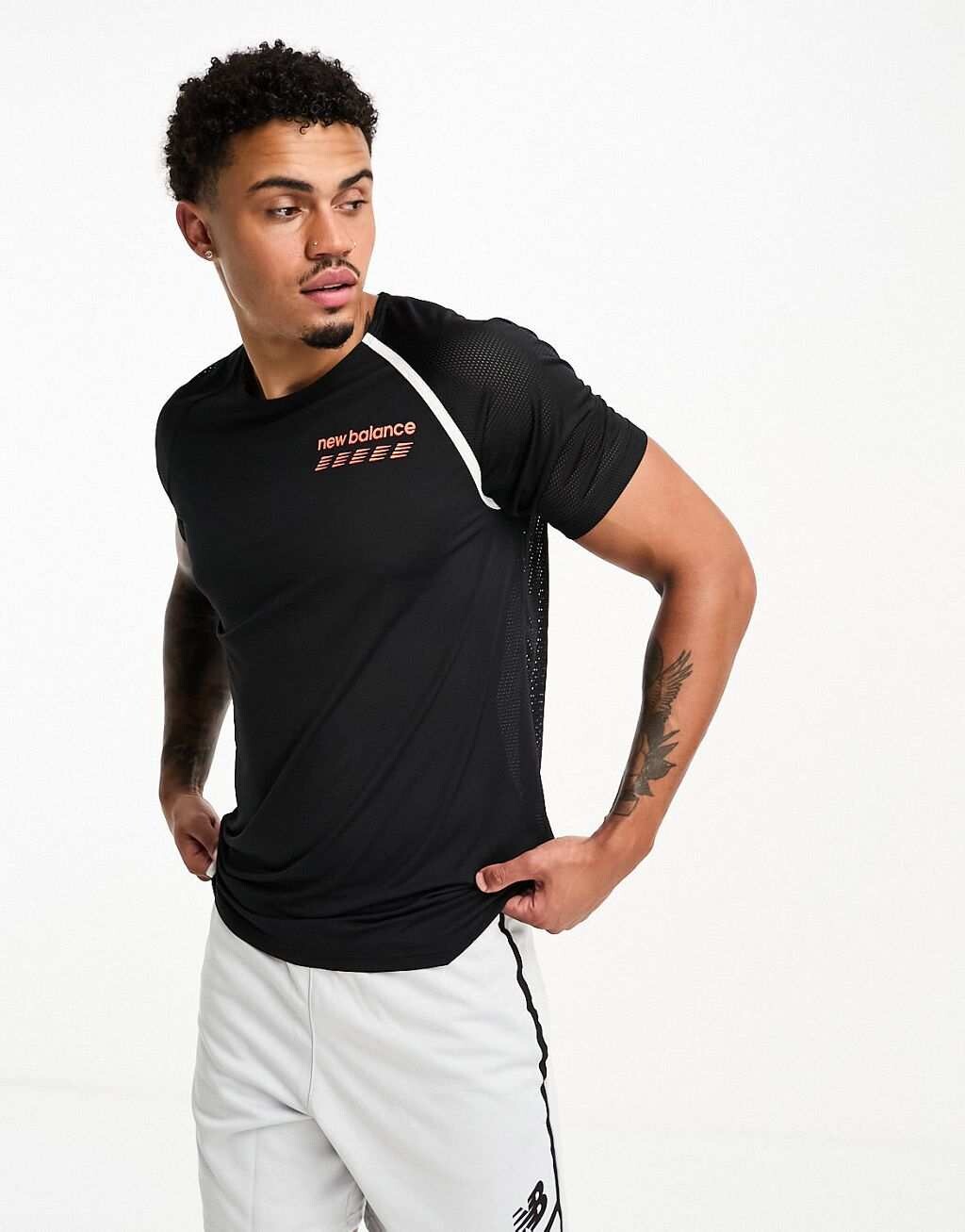

Черная футболка с короткими рукавами New Balance Accelerate Pacer