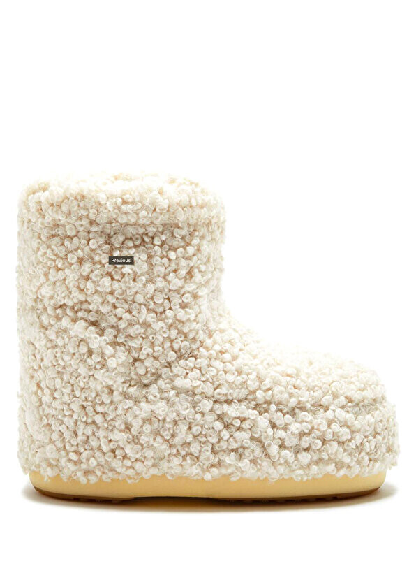 

Кремовые женские зимние сапоги из овчины Moon Boot