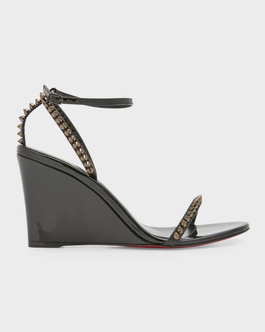 

Босоножки на танкетке So Me с красной подошвой и шипами Christian Louboutin