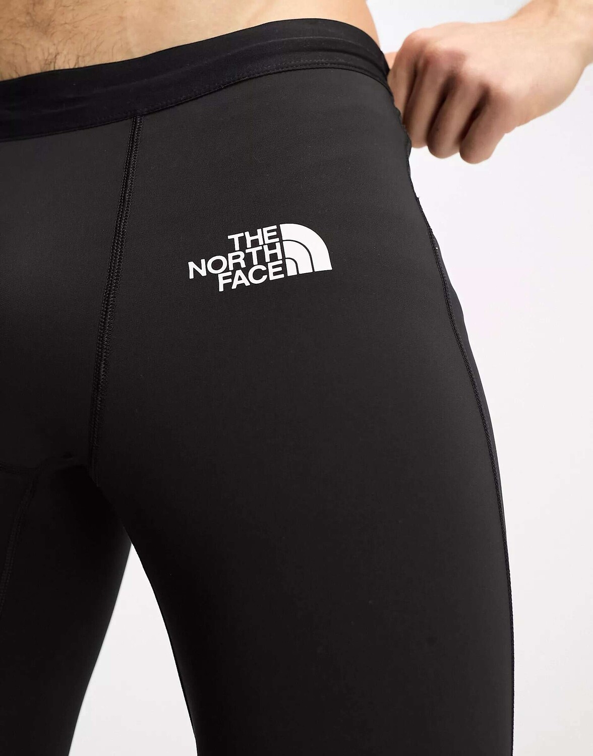 

The North Face Running Winter Теплые ветрозащитные тайтсы для бега черного цвета