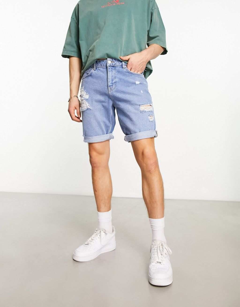 

Узкие джинсовые шорты средней длины с рваными краями ASOS DESIGN