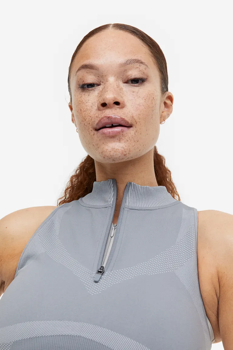 

Спортивный бюстгальтер medium support от drymove H&M, серый