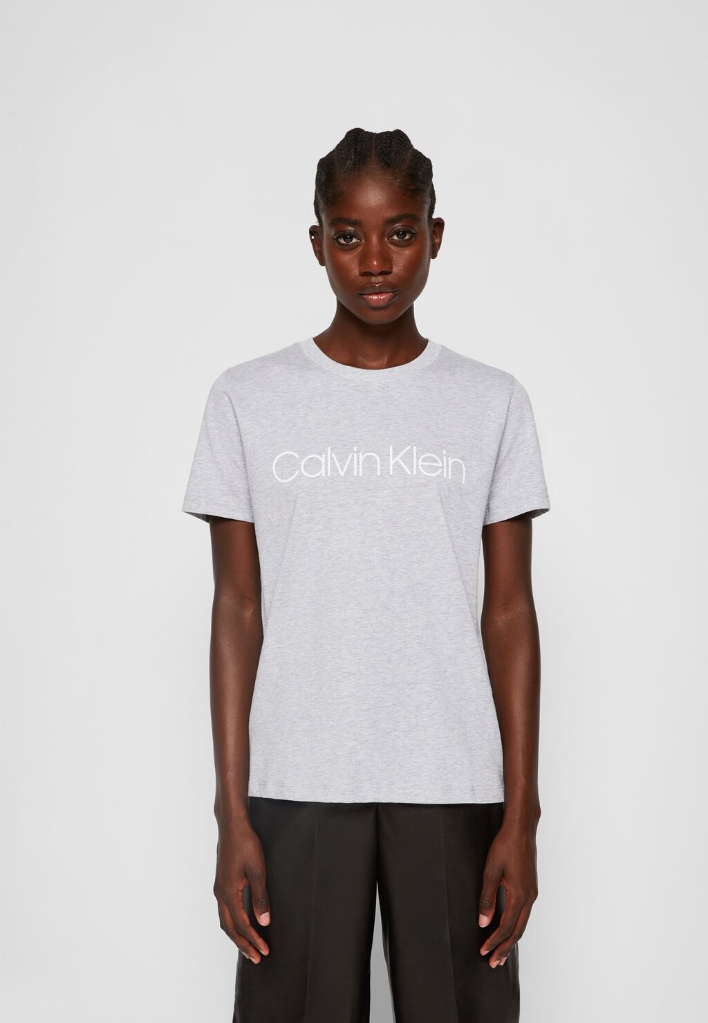 

Футболка с принтом Calvin Klein, Коричневый