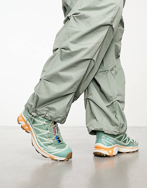 

Кроссовки Salomon XT-6 в цвете Гранитный зеленый/Aquifer/Пылающий оранжевый