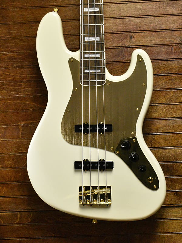 

Басс гитара SQUIER 40TH ANNIVERSARY J BASS LRL GHW GPG OWT