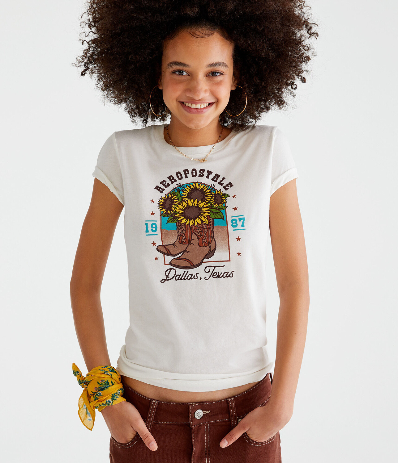 

Футболка с рисунком Dallas Texas Sunflower Boots Aeropostale, бежевый