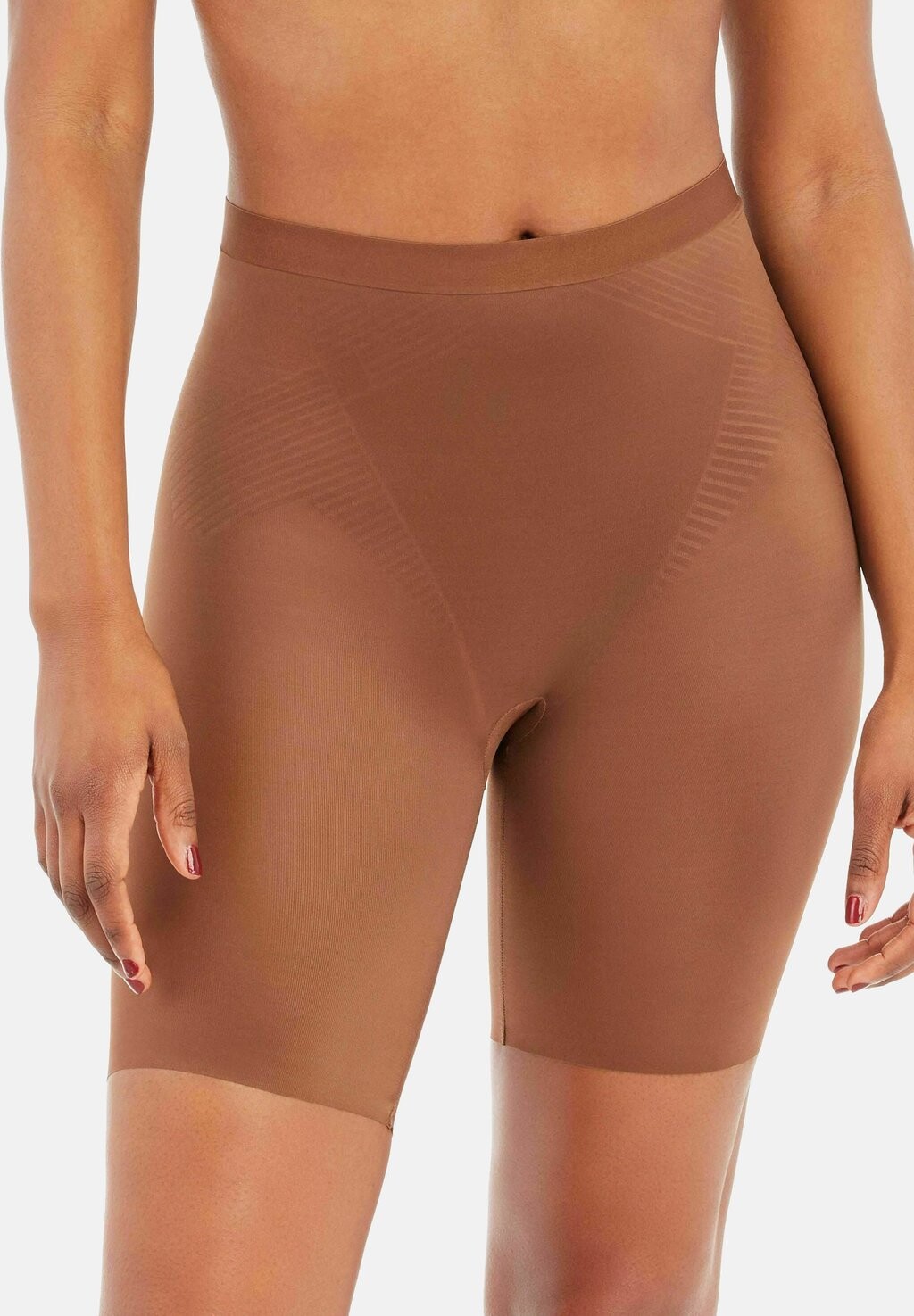 

Корректирующее белье Spanx