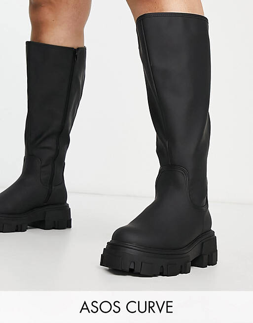 

Черные массивные ботинки на плоской подошве ASOS DESIGN Curve Carla