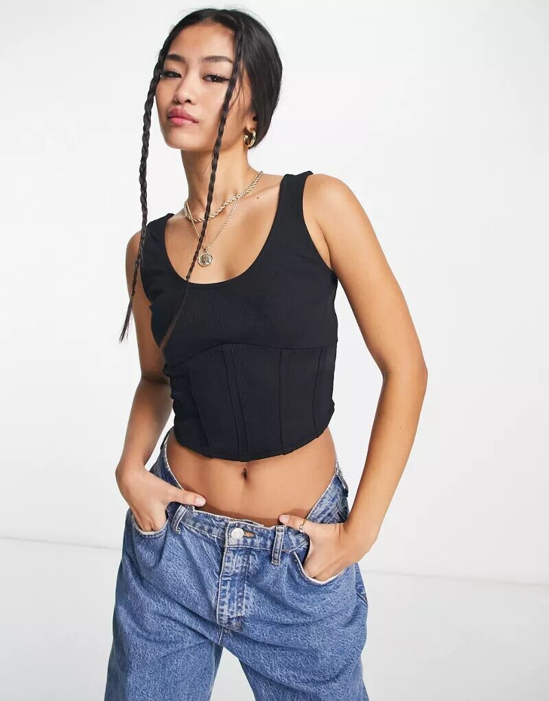 

Черный топ Vero Moda с корсетным швом