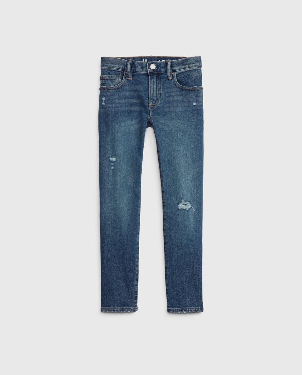 цена Узкие джинсы для мальчика с рваными краями Gap, синий