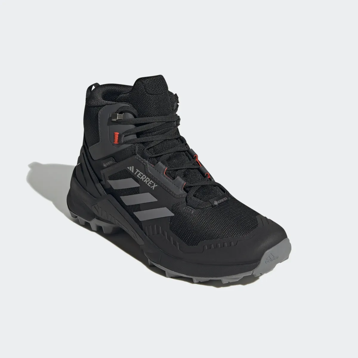 

Кроссовки adidas TERREX "TERREX SWIFT R3 MID GORE-TEX", водонепроницаемые, цвет Core Black / Grey Three / Solar Red