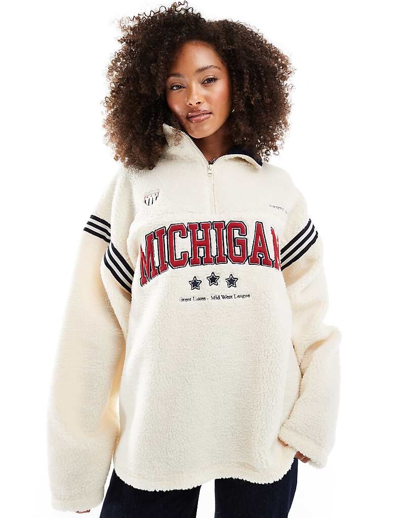 

Толстовка на молнии из искусственной овчины с нашивкой «Мичиган» ASOS DESIGN