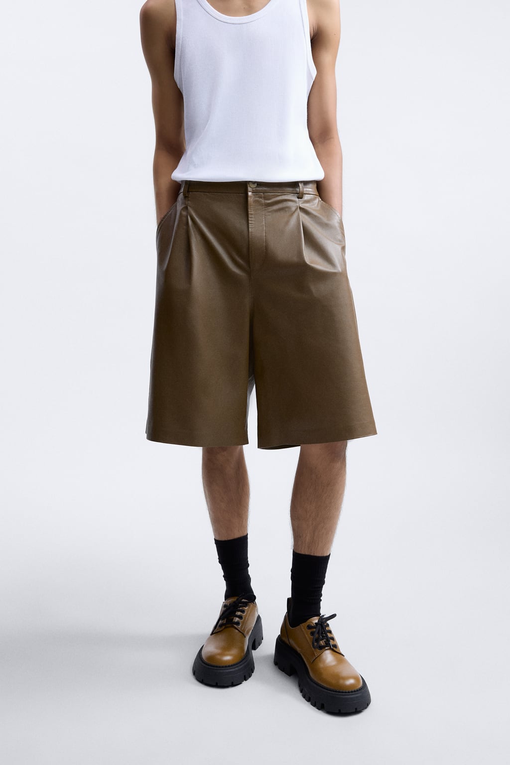 Men in Oversized Bermuda shorts