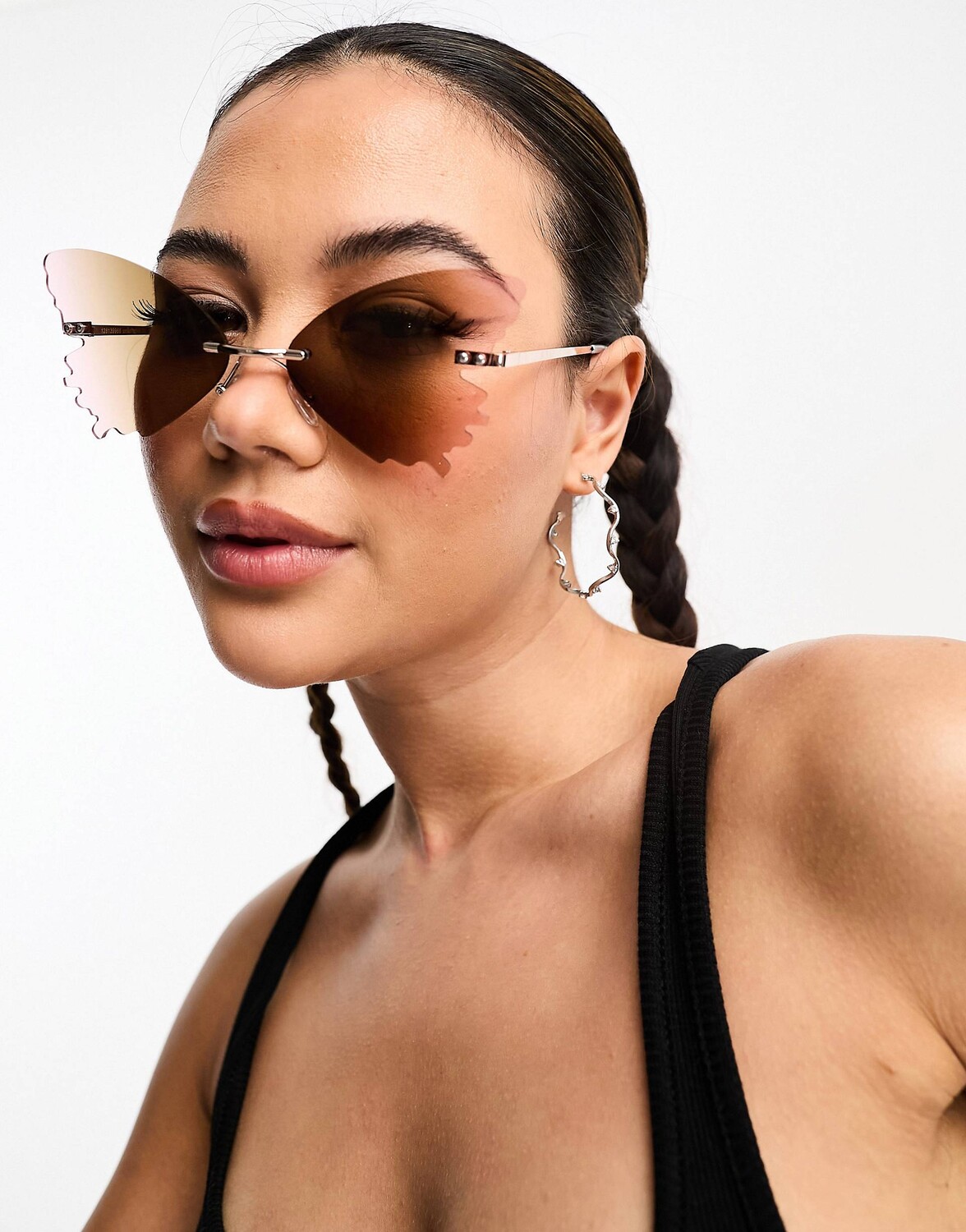 

Фиолетовые солнцезащитные очки без оправы с бабочкой ASOS DESIGN