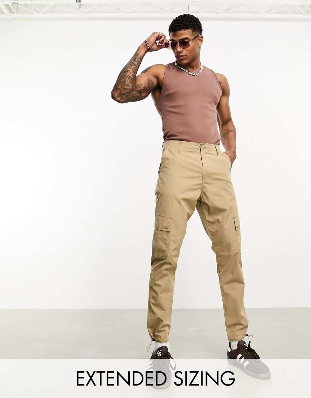 

Зауженные брюки карго цвета хаки ASOS DESIGN