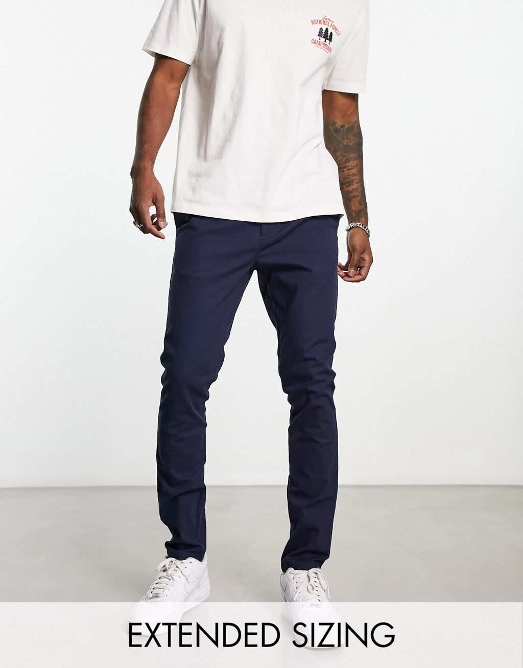 

Темно-синие чиносы скинни ASOS DESIGN, Синий