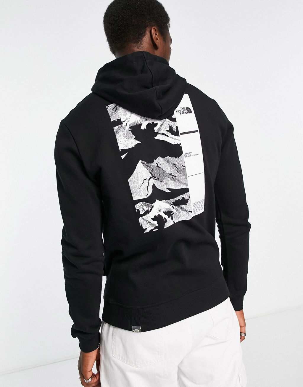 

Черная худи с принтом на спине The North Face Coordiantes