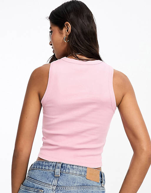 

Розовый жилет в рубчик с изображением Лас-Вегаса ASOS DESIGN Hotfix