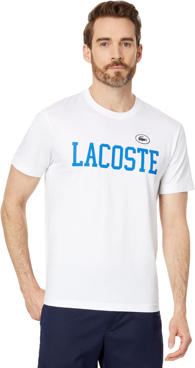 

Футболка Lacoste Short Sleeve Classic Fit Tee Shirt w/ Large Lacoste Wording, цвет Blanc