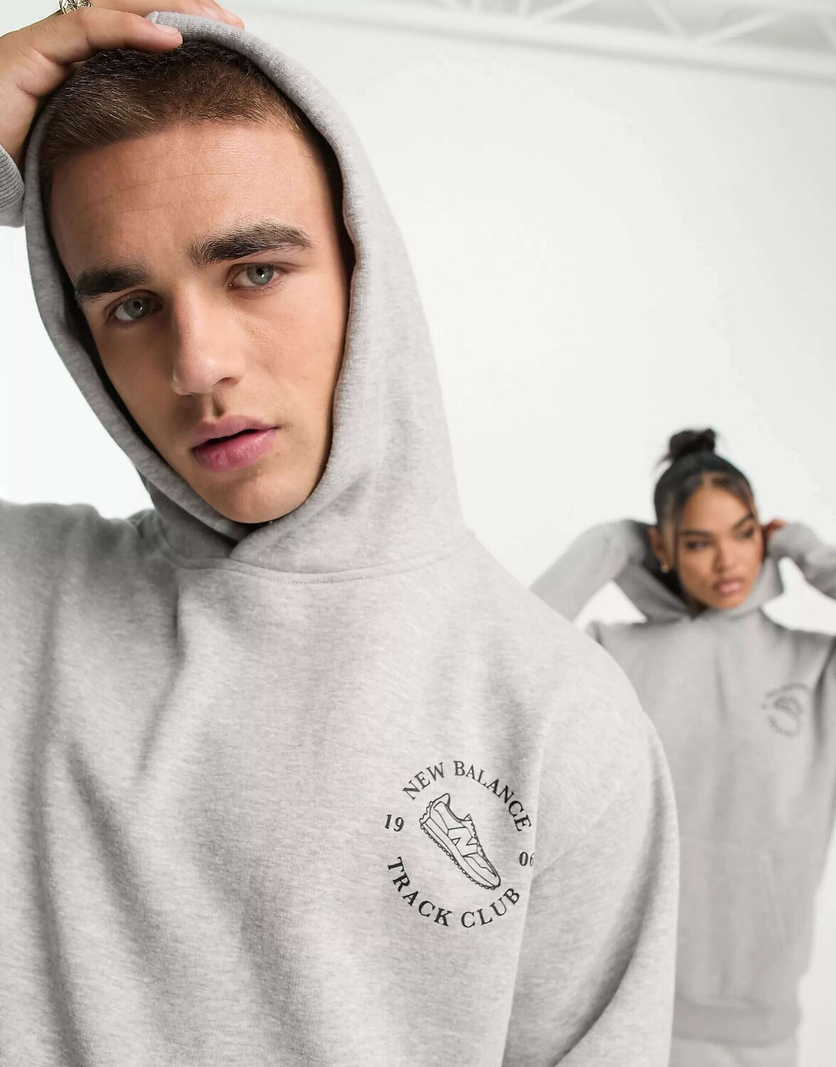

Серая толстовка унисекс для бегунов New Balance, Серый
