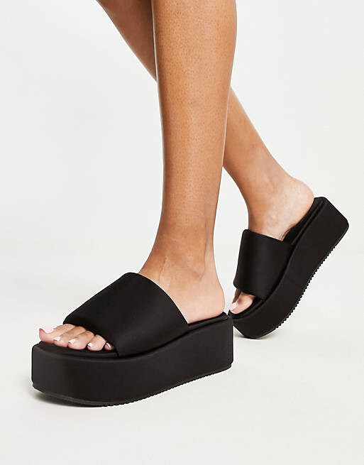 

Черные утепленные сандалии на плоской платформе ASOS DESIGN Tyla