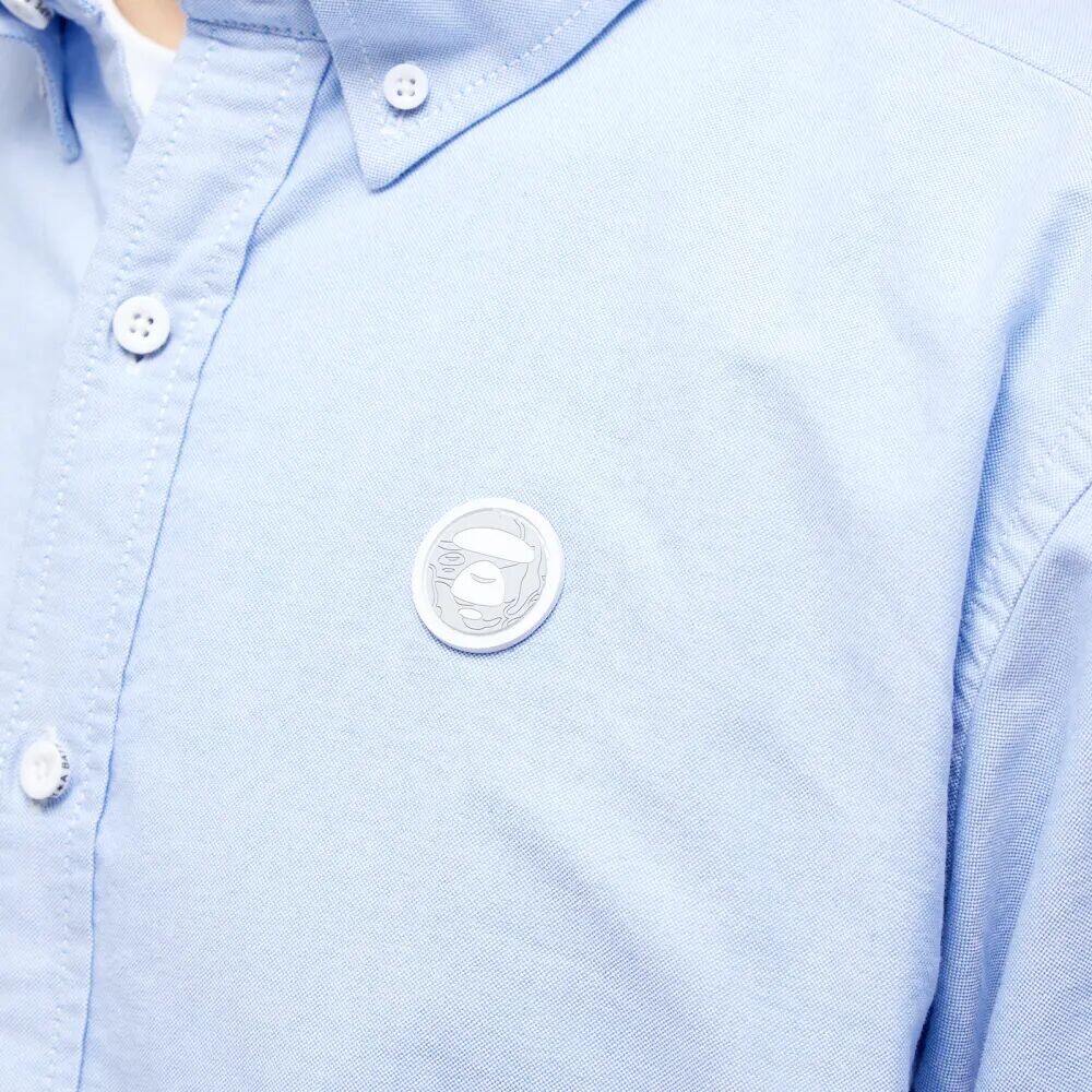 

Оксфордская рубашка с камуфляжным силиконовым значком AAPE by A Bathing Ape Now, синий