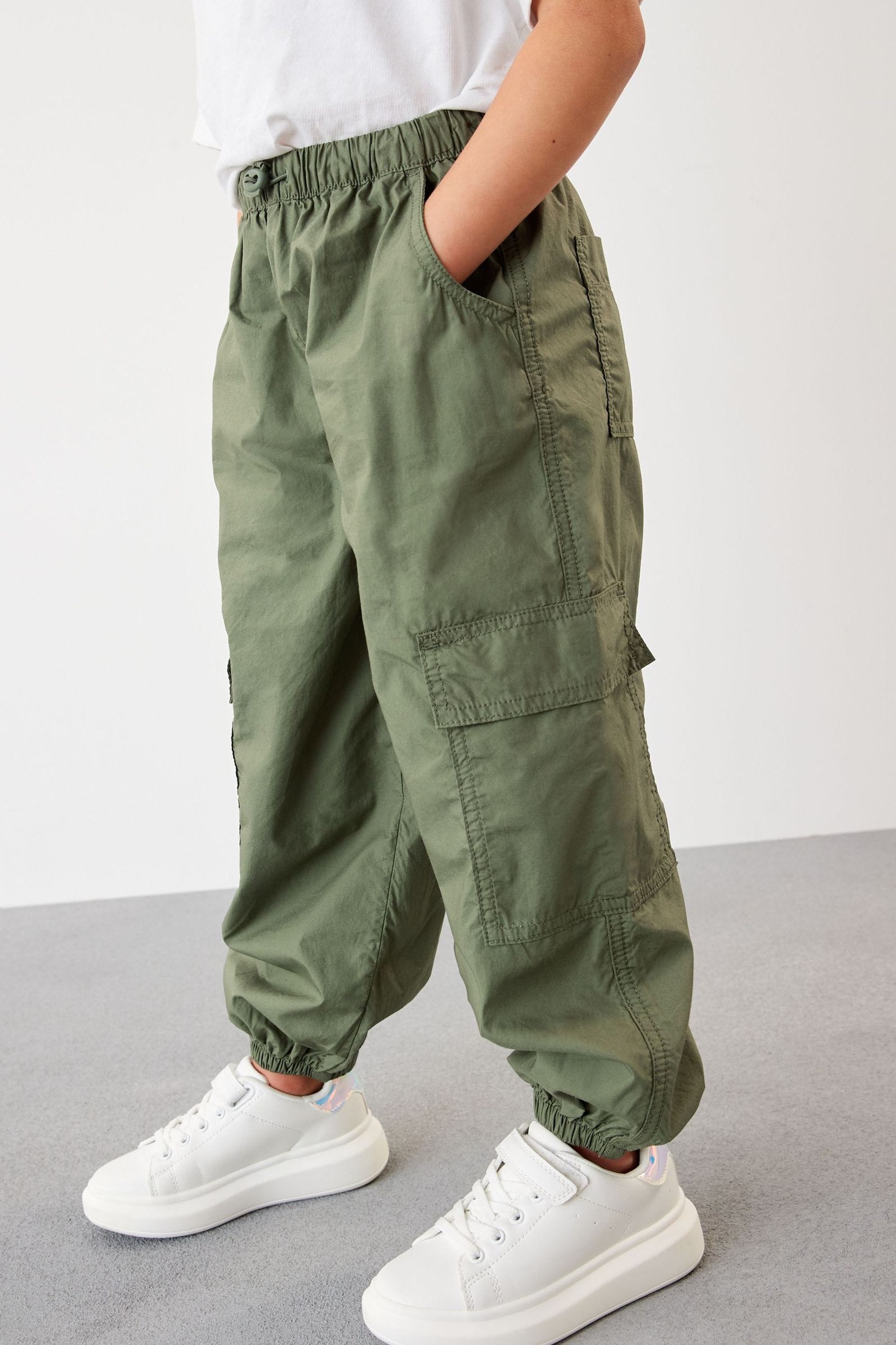 цена Широкие брюки-карго с манжетами Next, зеленый