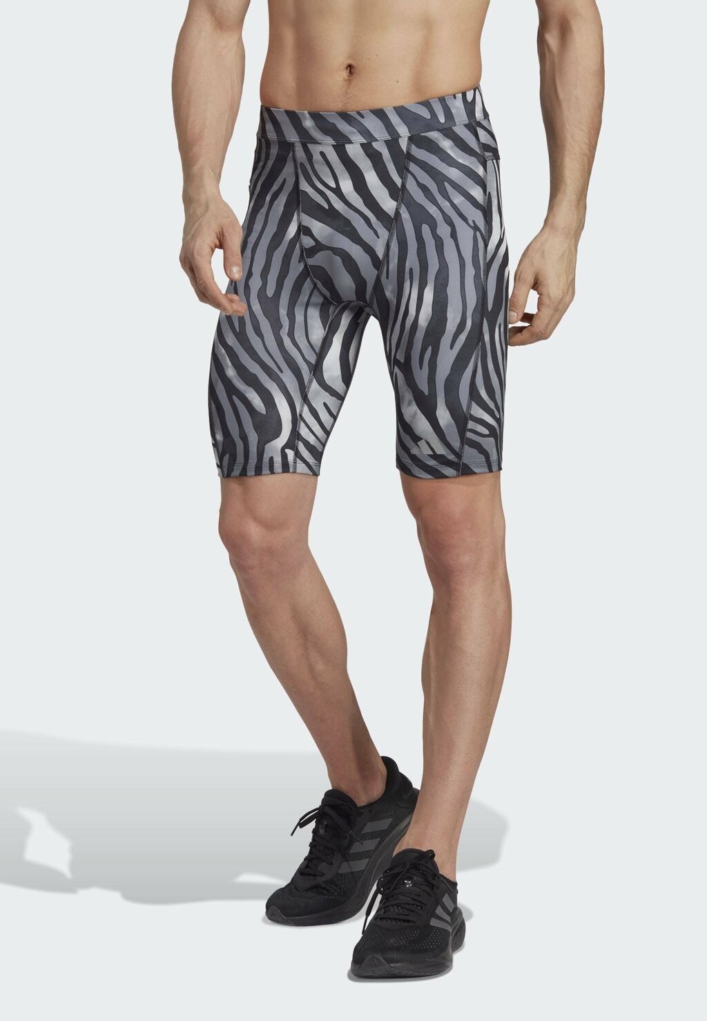 

Тайтсы Adidas, светло-серый