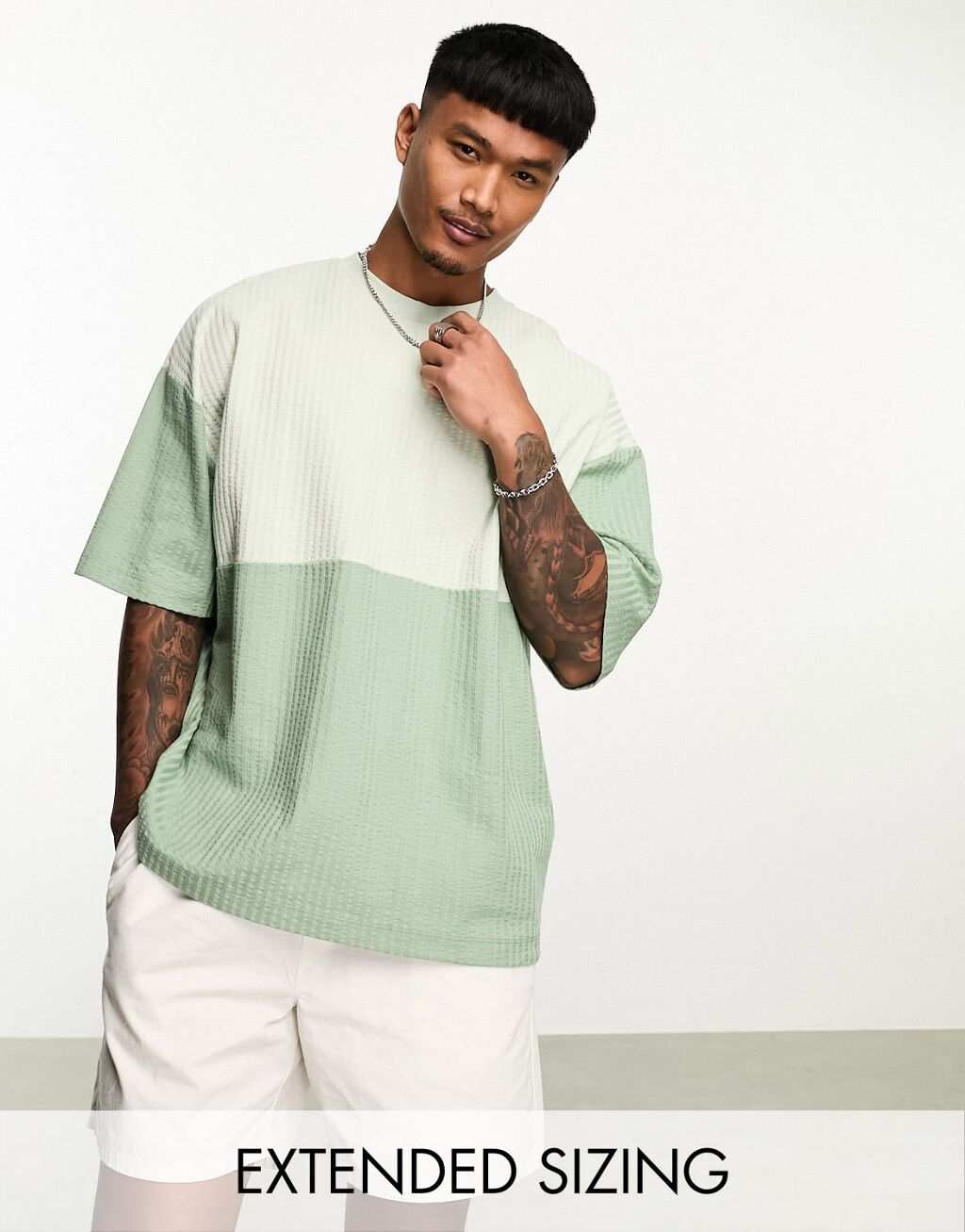 

Объемная футболка цвета хаки в стиле колор-блок ASOS DESIGN