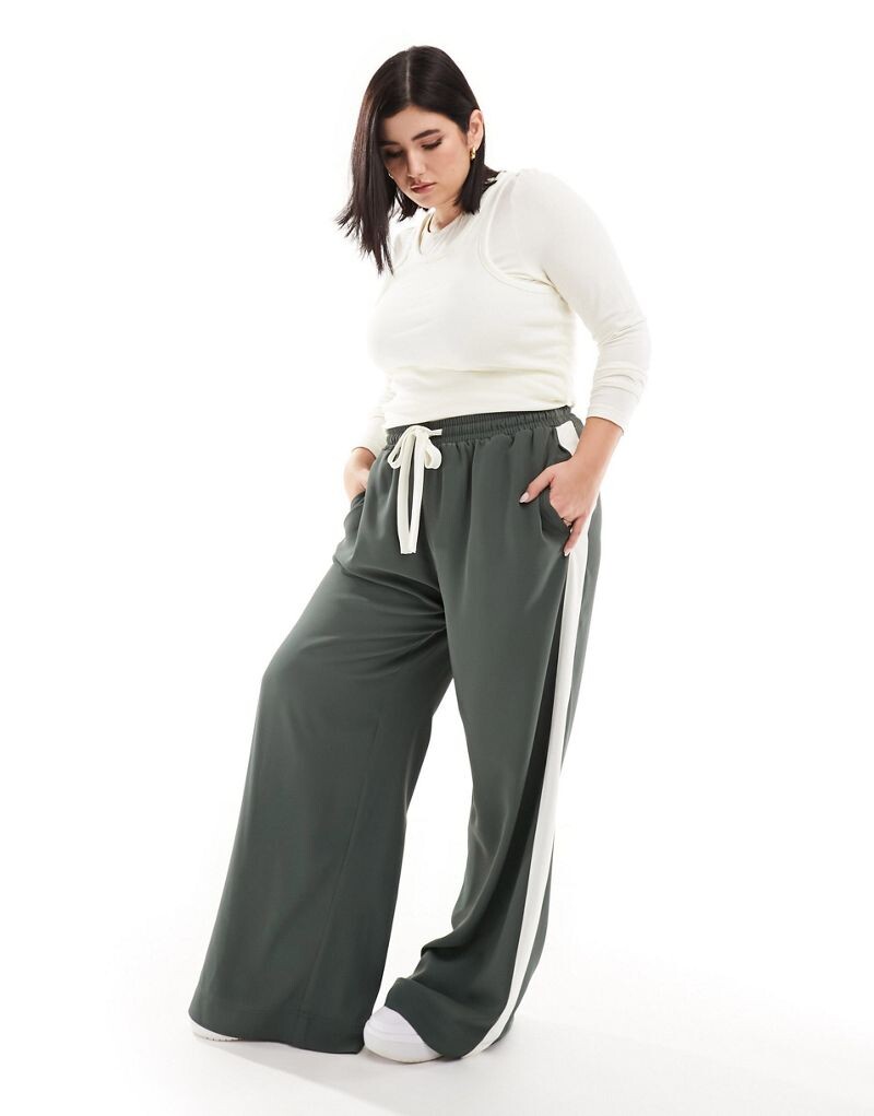

Зеленые брюки с контрастной вставкой ASOS DESIGN Curve