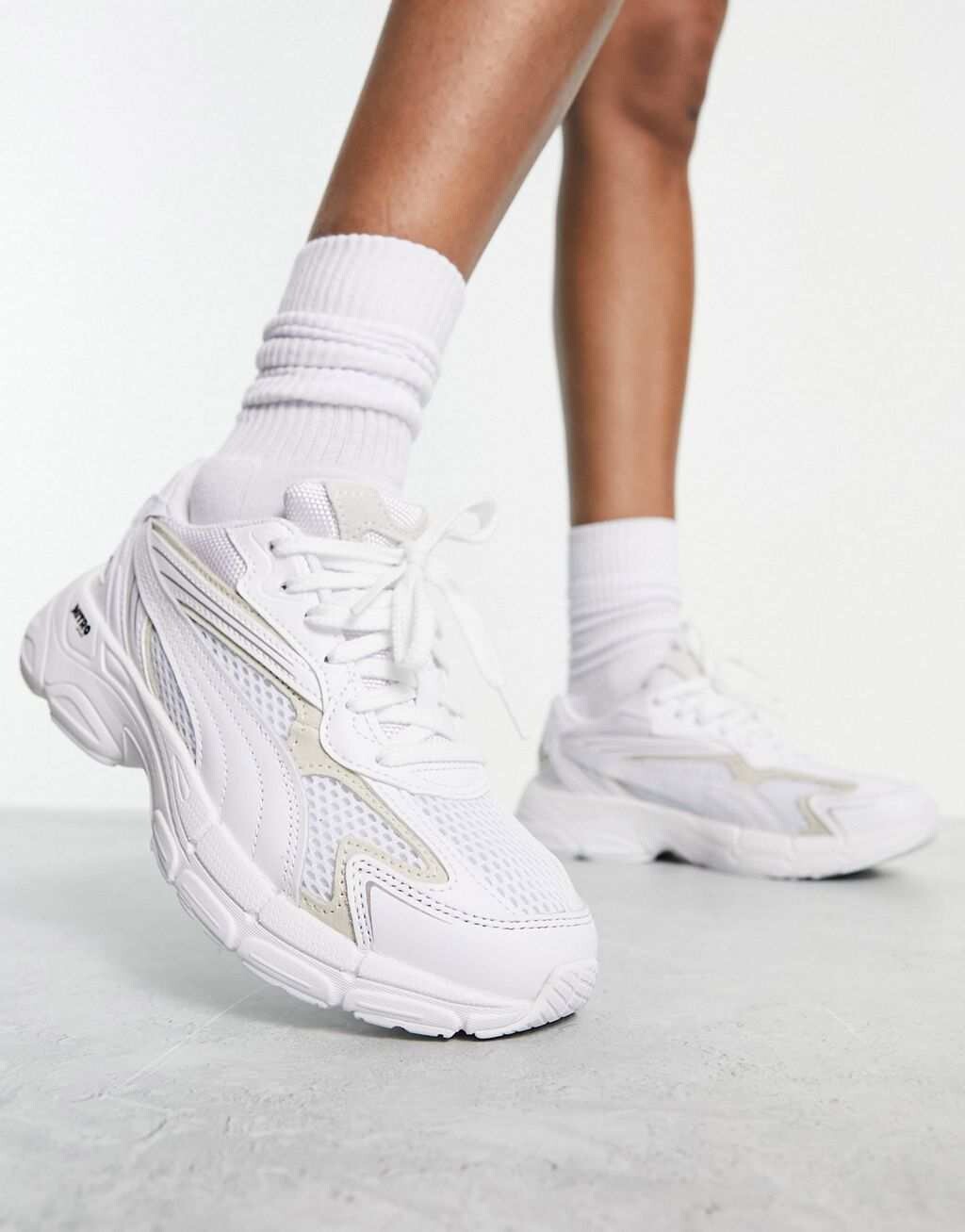 

Бело-кремовые кроссовки Puma Teveris Nitro, Бежевый