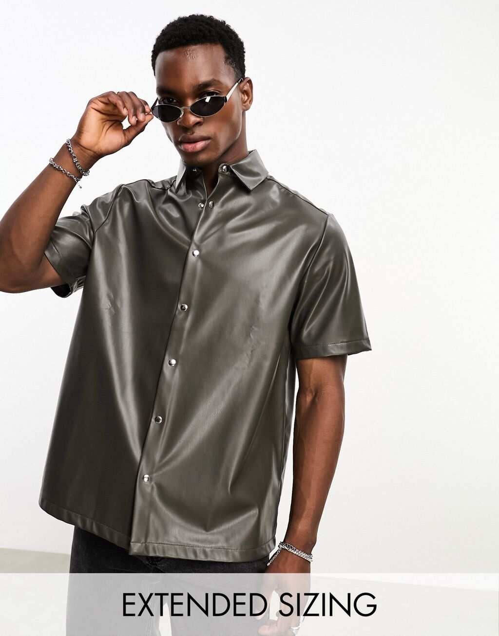 

Коричневая рубашка свободного кроя из искусственной кожи ASOS DESIGN