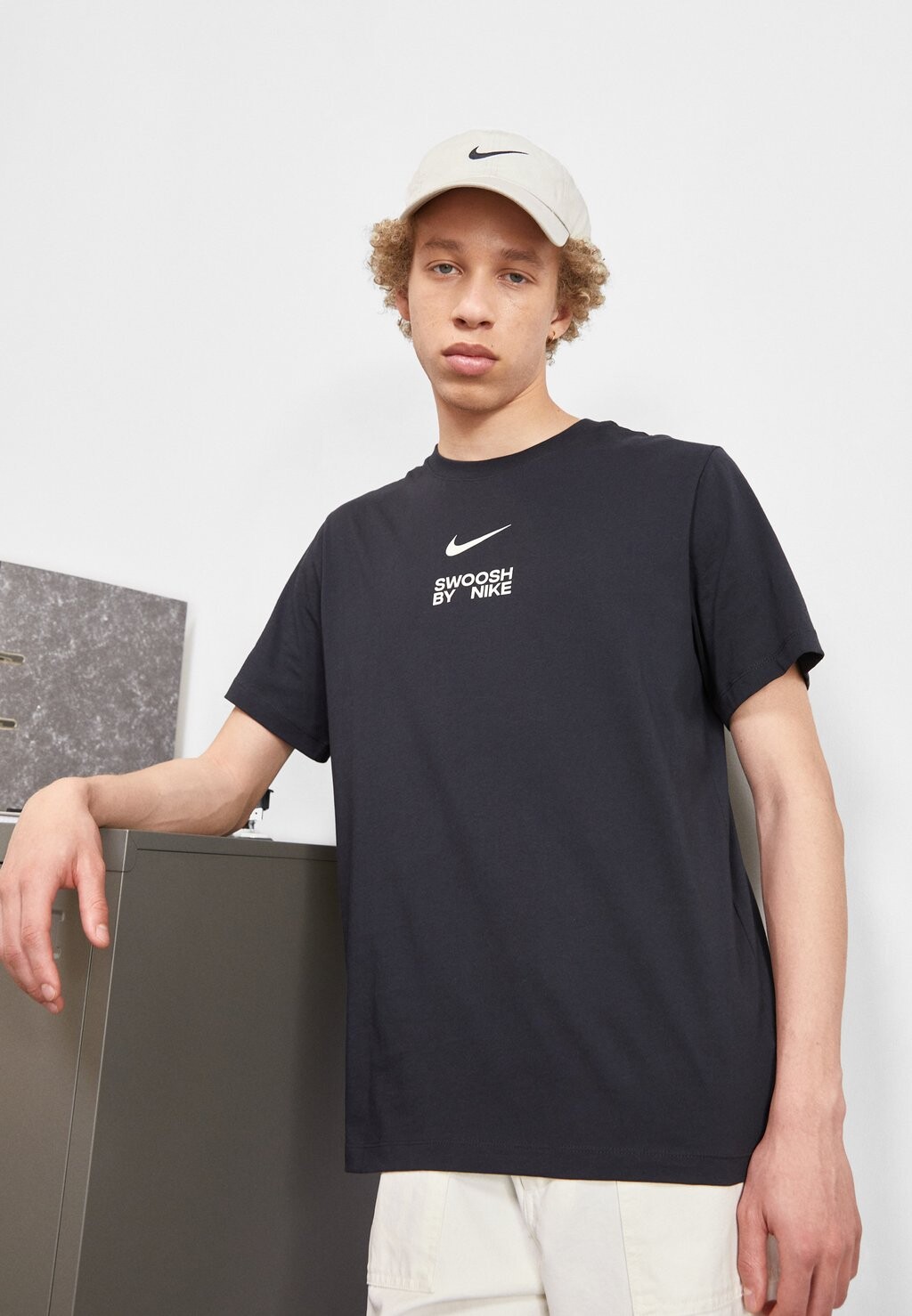 

Футболка с принтом TEE BIG Nike, черный