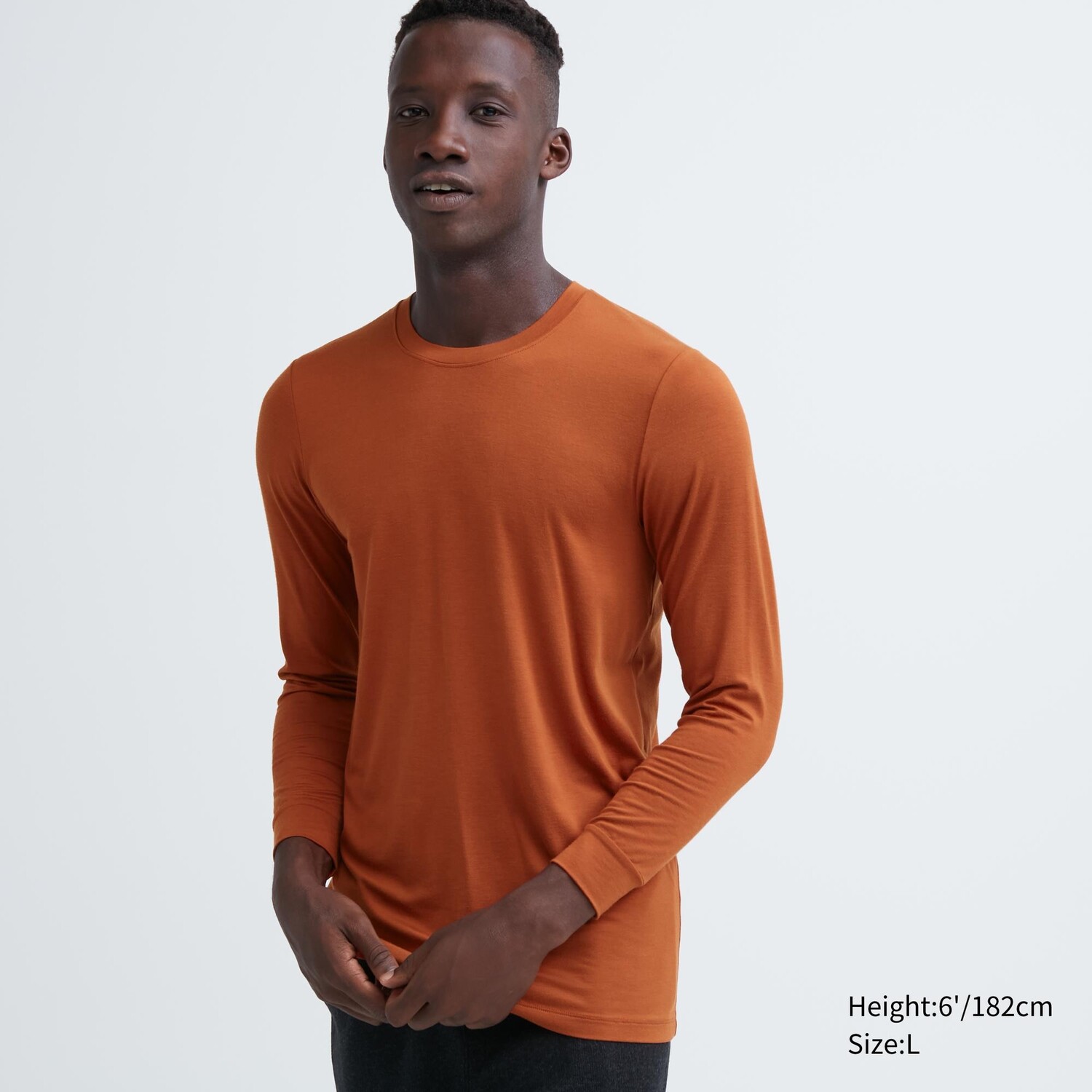 

Футболка Uniqlo Heattech с длинными рукавами и круглым вырезом, темно - оранжевый