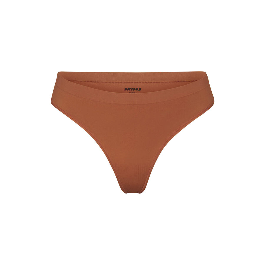 

Стринги SKIMS Soft Smoothing Seamless, бронзовый