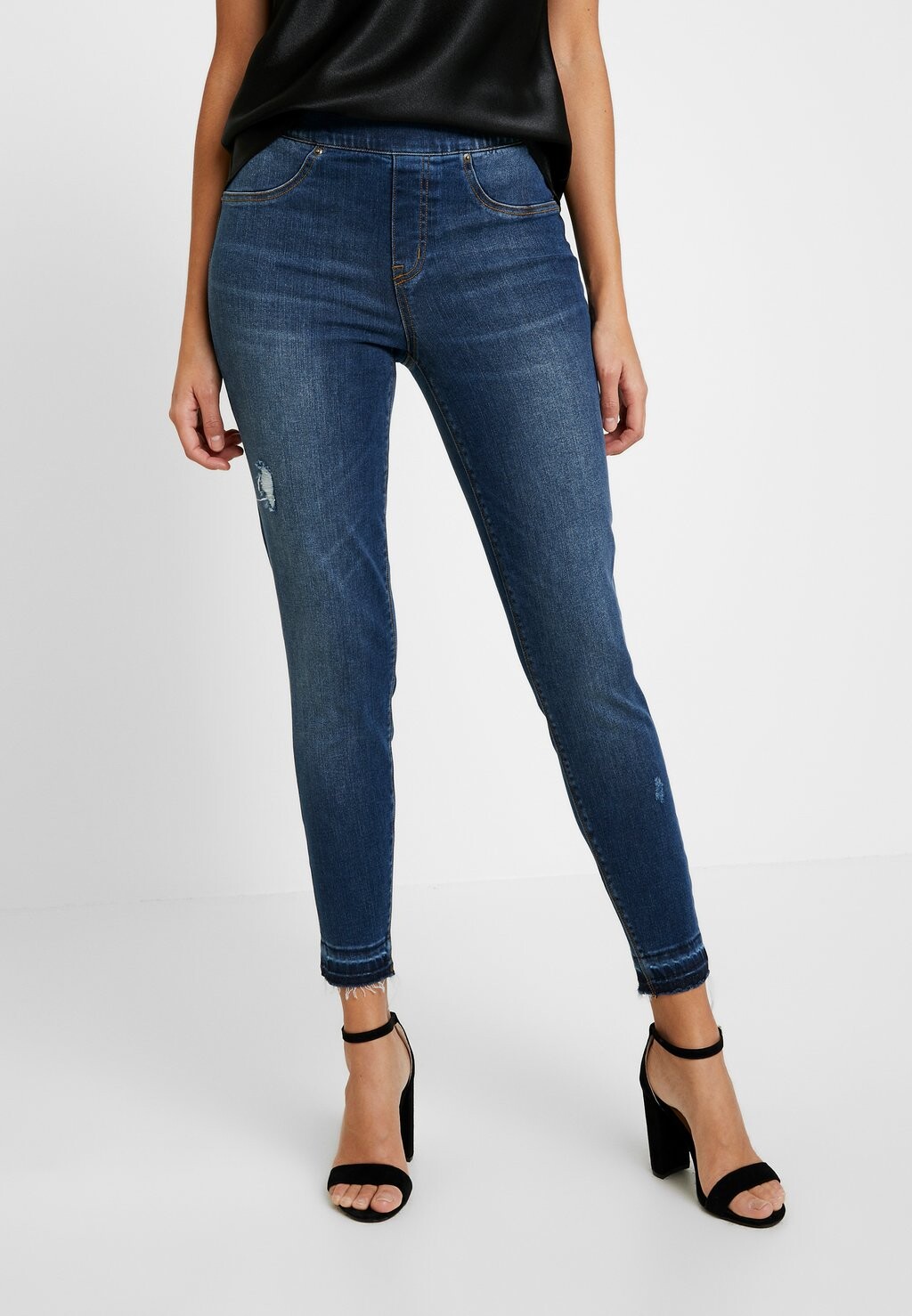 

Джинсы Skinny Fit Spanx