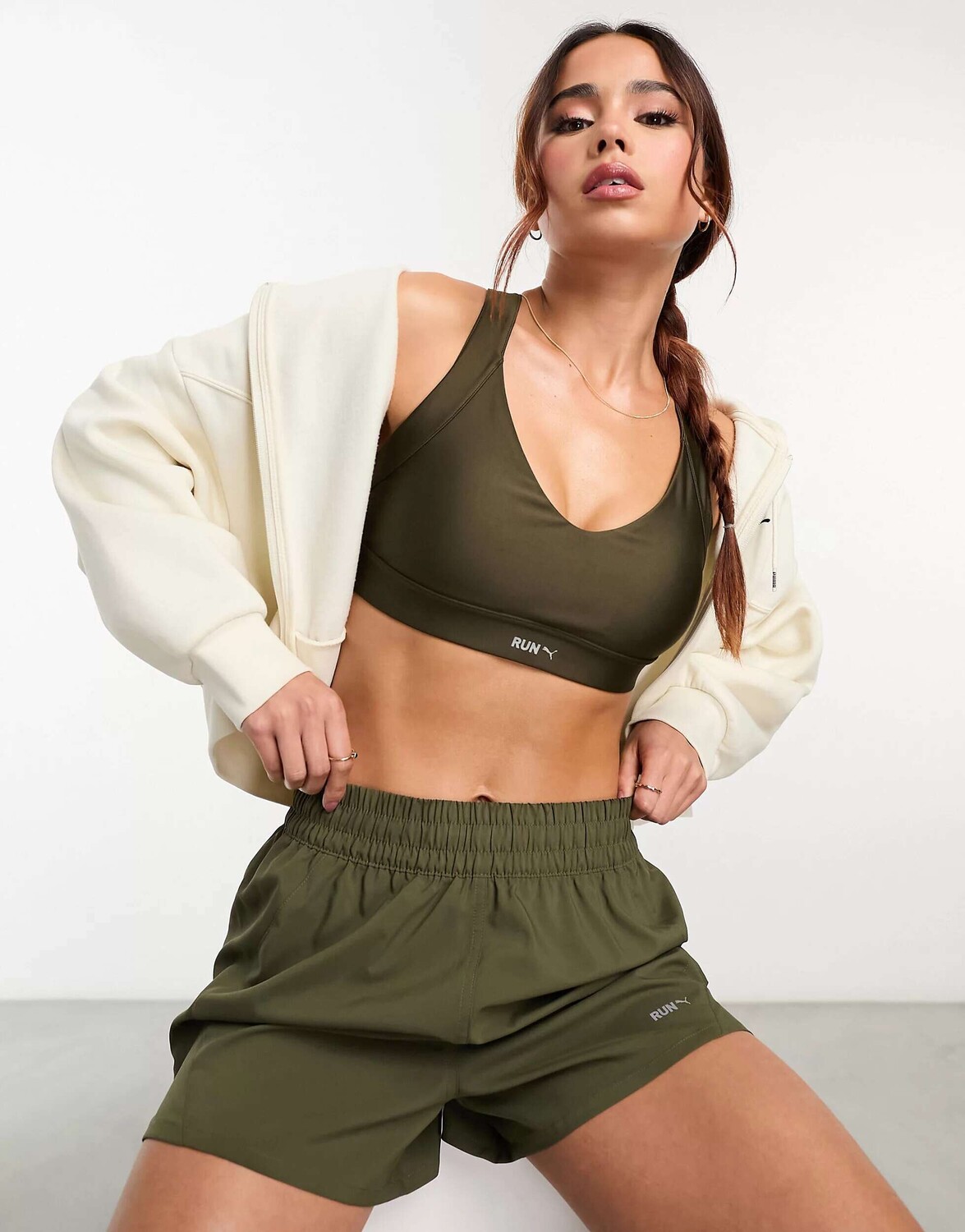 

Спортивный бюстгальтер с высокой поддержкой Puma Running Evolve цвета хаки