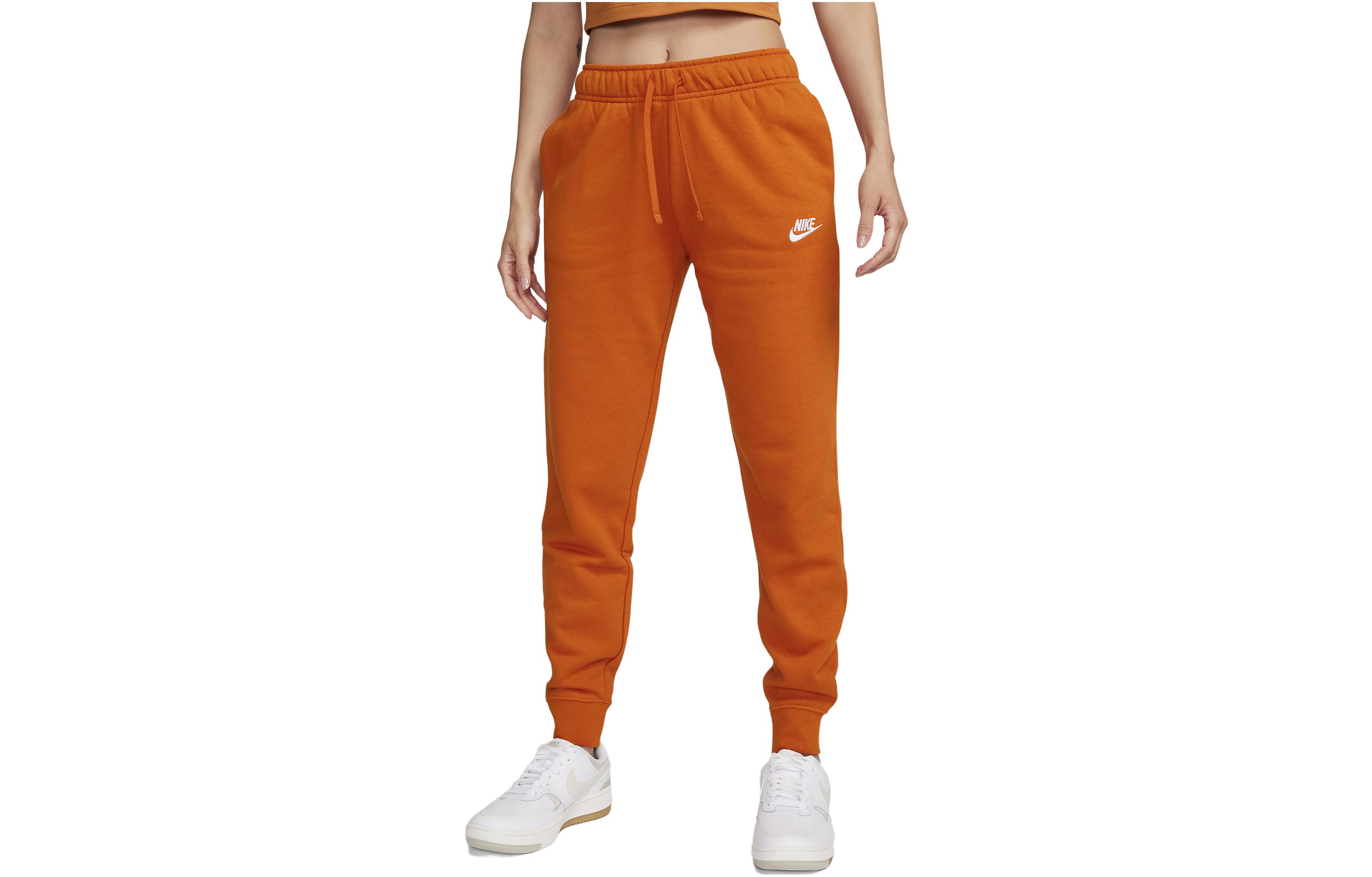 

Трикотажные спортивные штаны женские Campfire Orange Nike