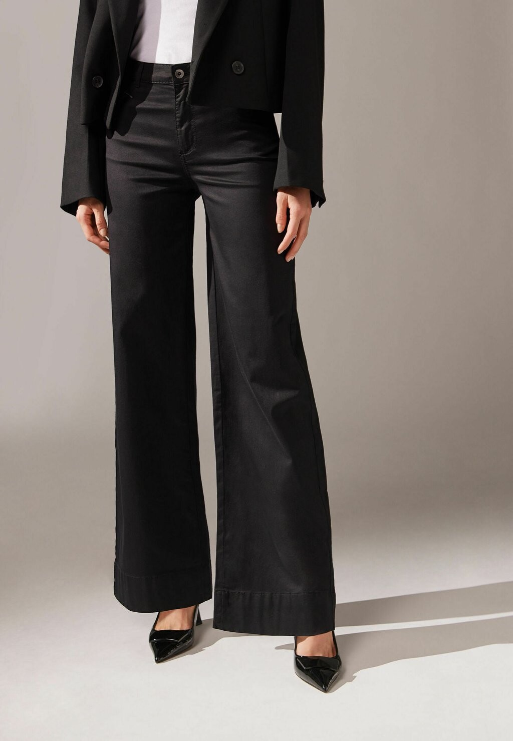 

Расклешенные джинсы PALAZZO ECO Calzedonia, черный деним