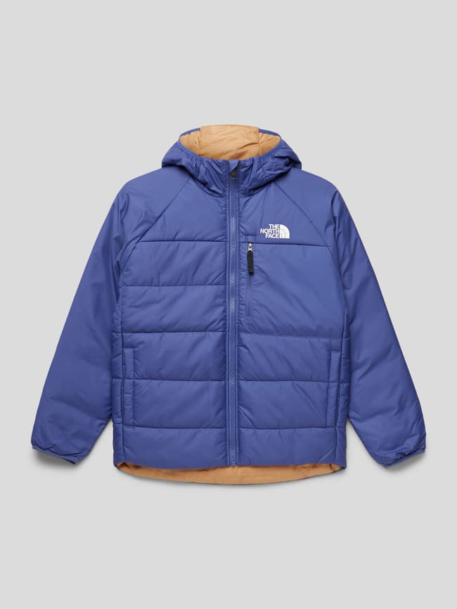 

Стеганая куртка с двусторонней функцией и принтом этикетки The North Face, синий