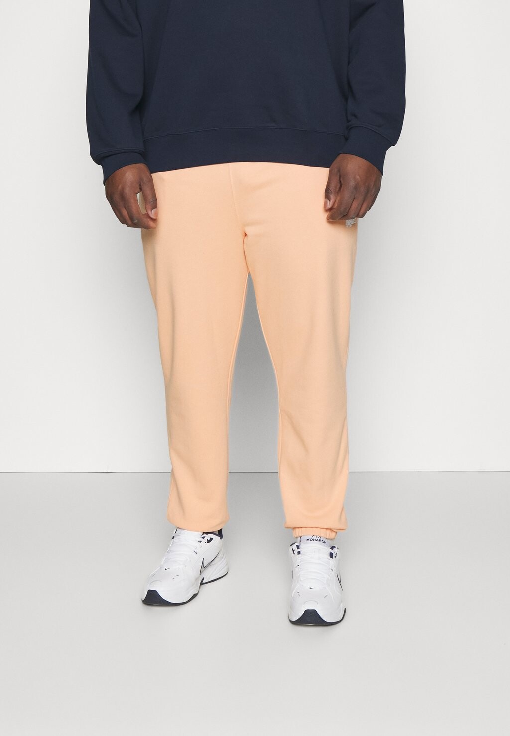 

Тренировочные брюки Lacoste, лосось