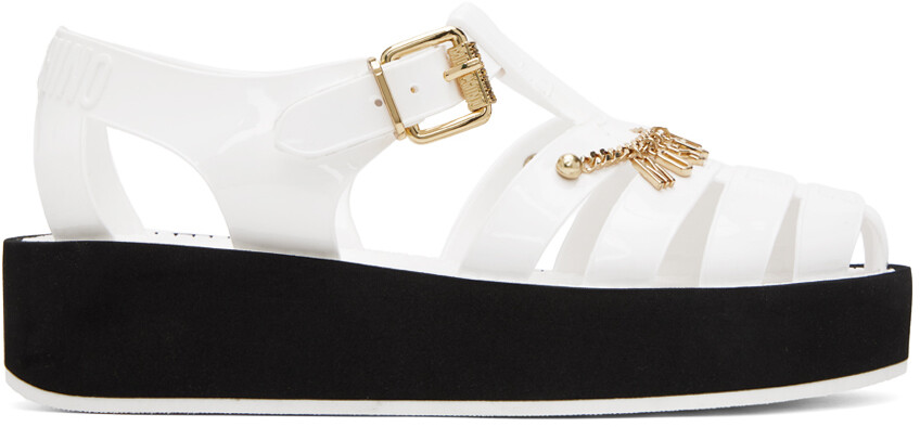 

Белые прозрачные сандалии Moschino