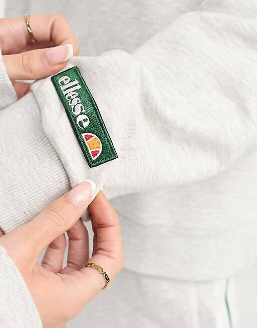 

Серый свободный свитшот унисекс Community Club Ellesse