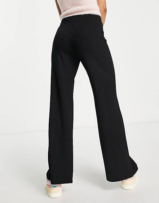 

Черные базовые широкие брюки из джерси ASOS DESIGN Petite, Черный