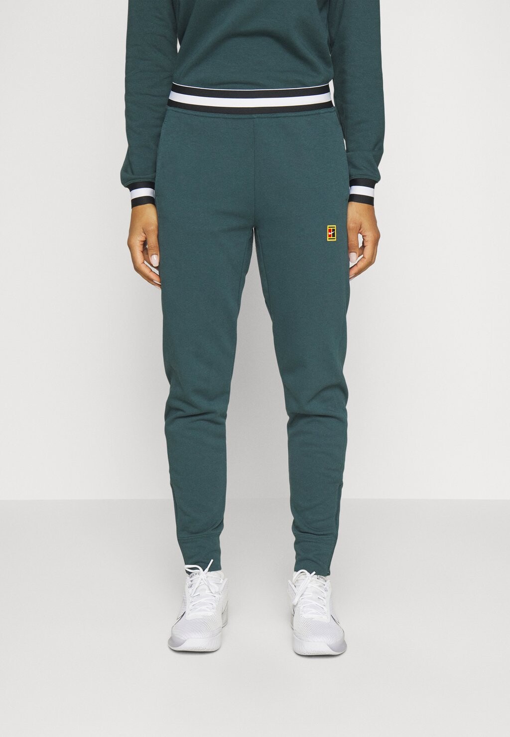 

Спортивные штаны Nike W NKCT DF HERITAGE FLC PANT, Deep Jungle