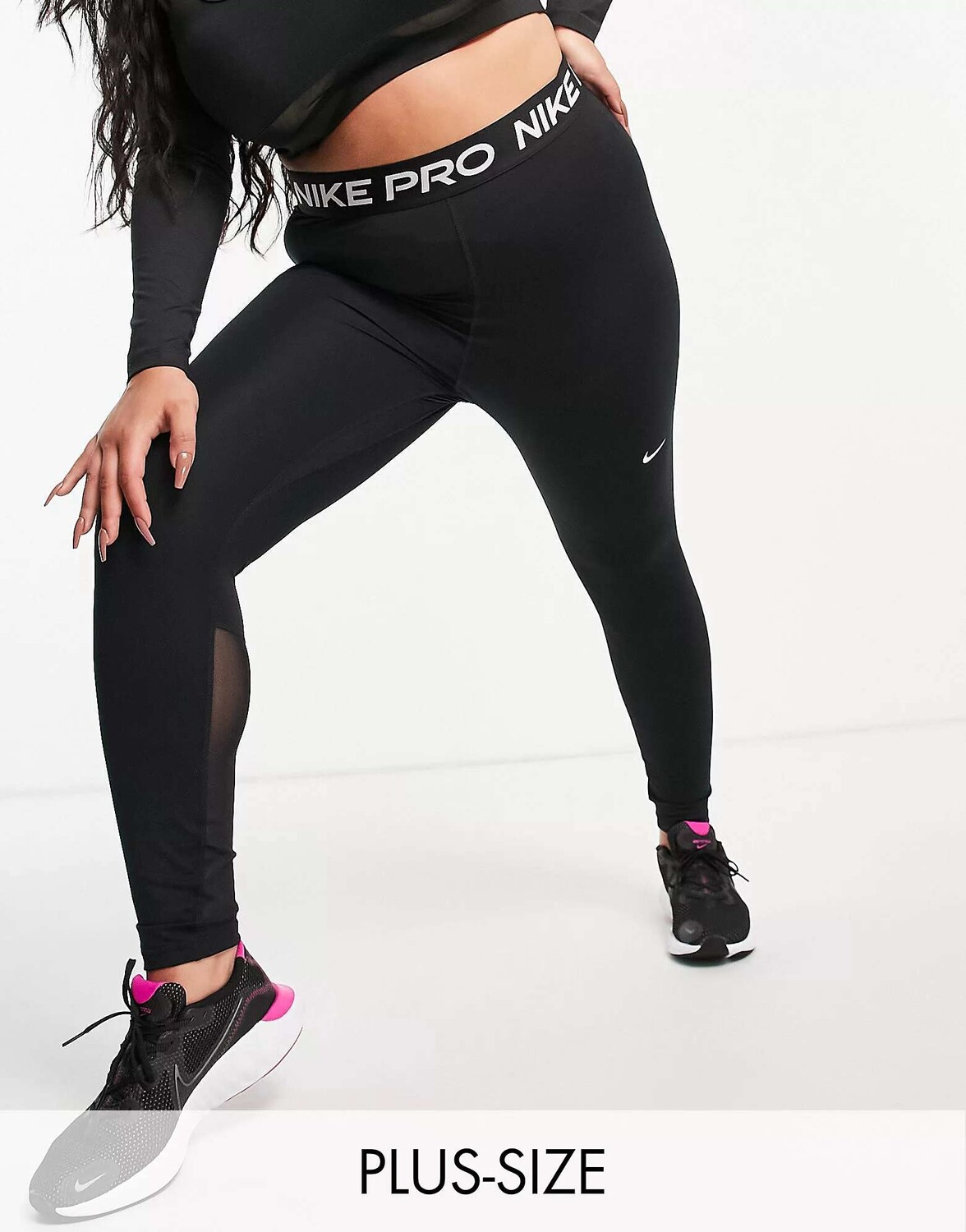

Черные леггинсы Nike Plus 365