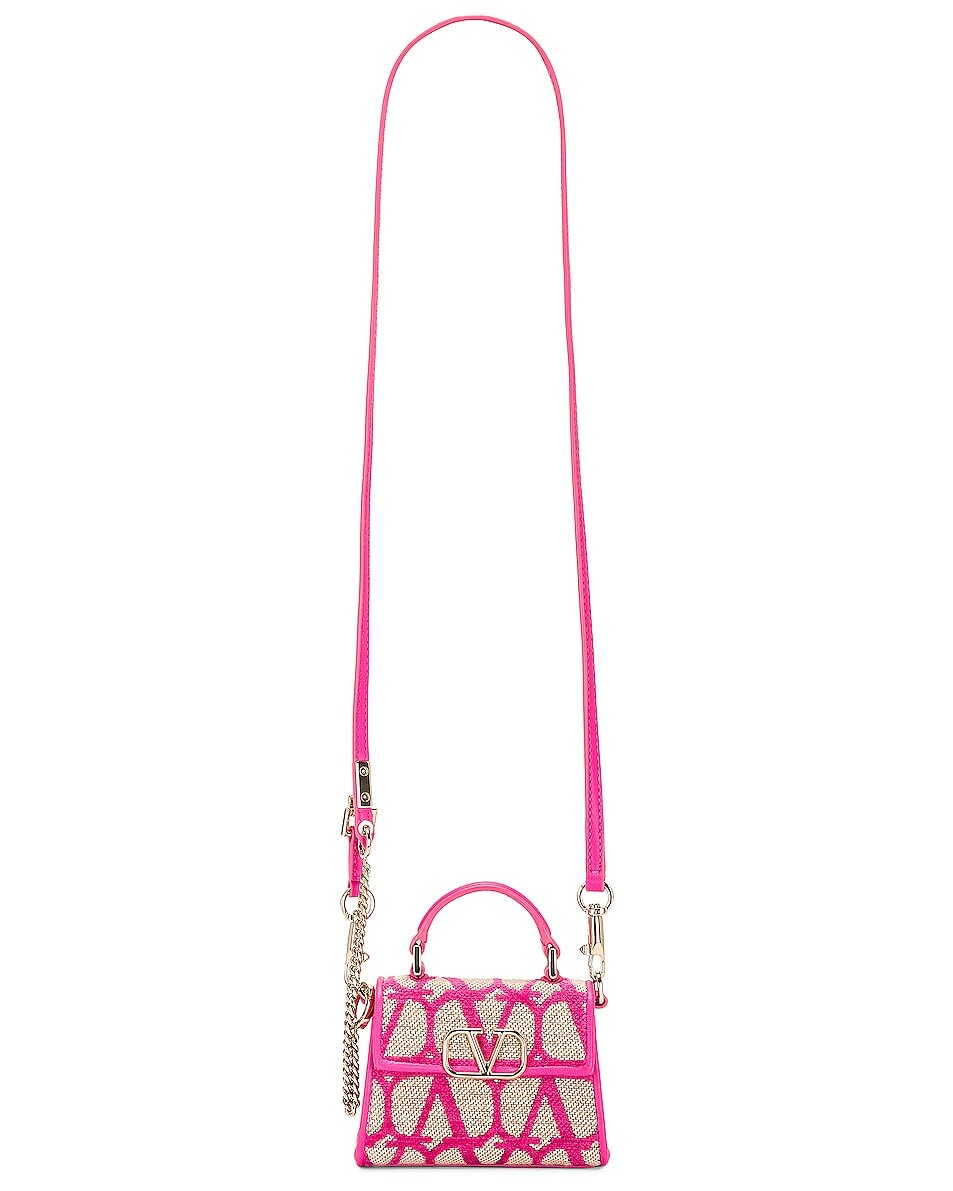 

Сумка кросс-боди Valentino Garavani V Sling Micro Top Handle, цвет Naturale & Pink