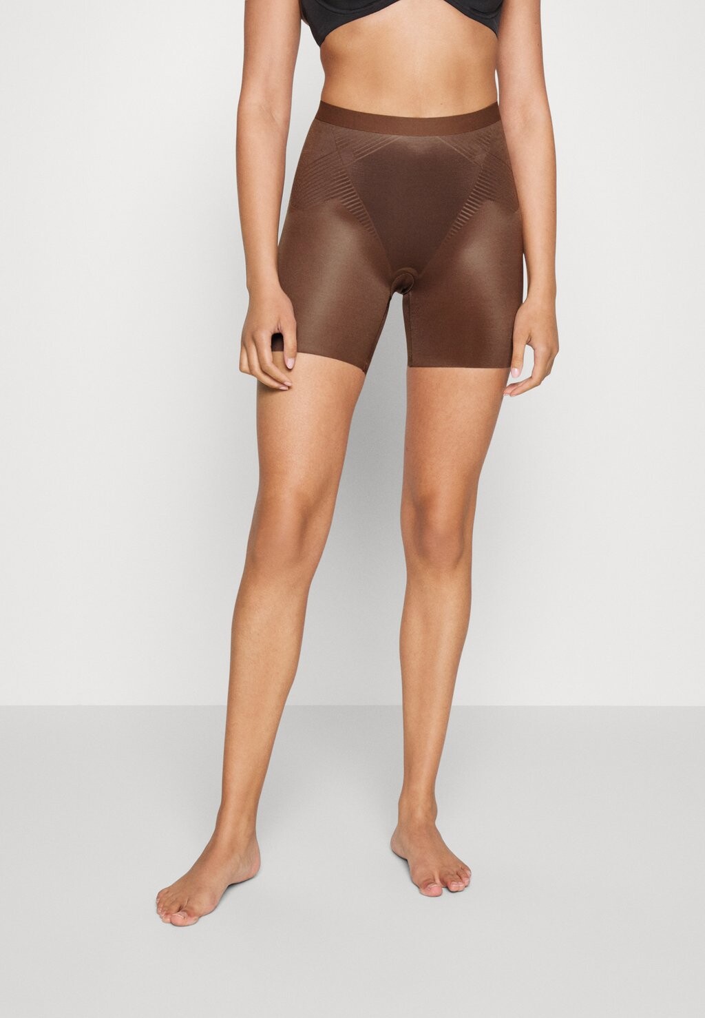 

Корректирующее белье Spanx